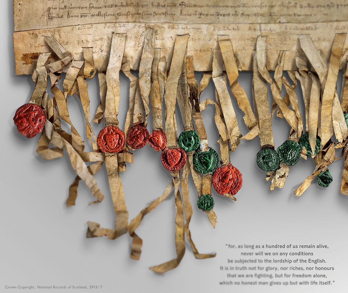 Close detail of the Pearl Burnished Gold Declaration of Arbroath print showing hanging parchment tags, red and green seals and the freedom quotation on the pale background.