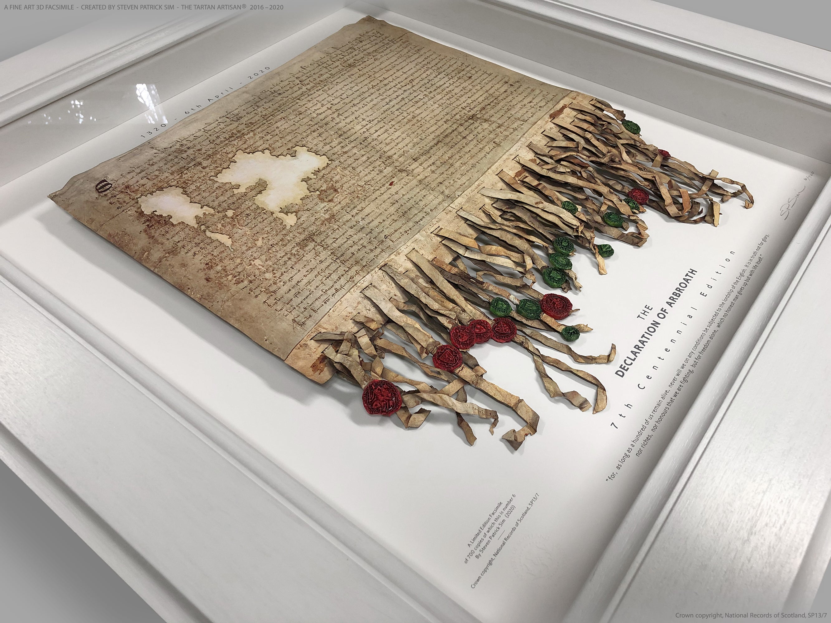 Diagonal close view of the white-framed Declaration of Arbroath Fine-Art 3D Facsimile, with parchment, ribbon tabs and cast seal details visible through the frame.