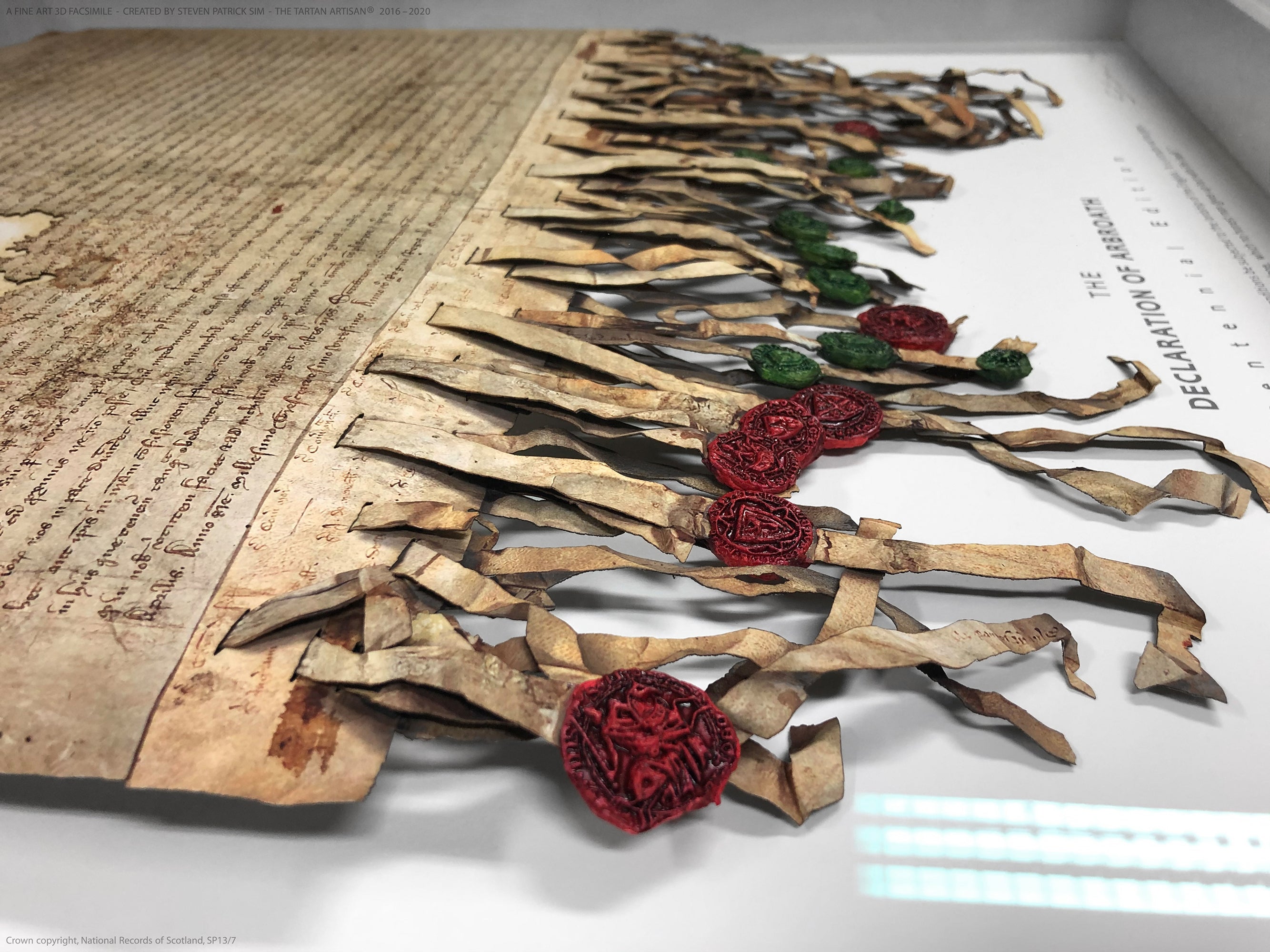 Detailed view of the parchment fringe, ribbon tabs and red and green cast seals on the Declaration of Arbroath Fine-Art 3D Facsimile.