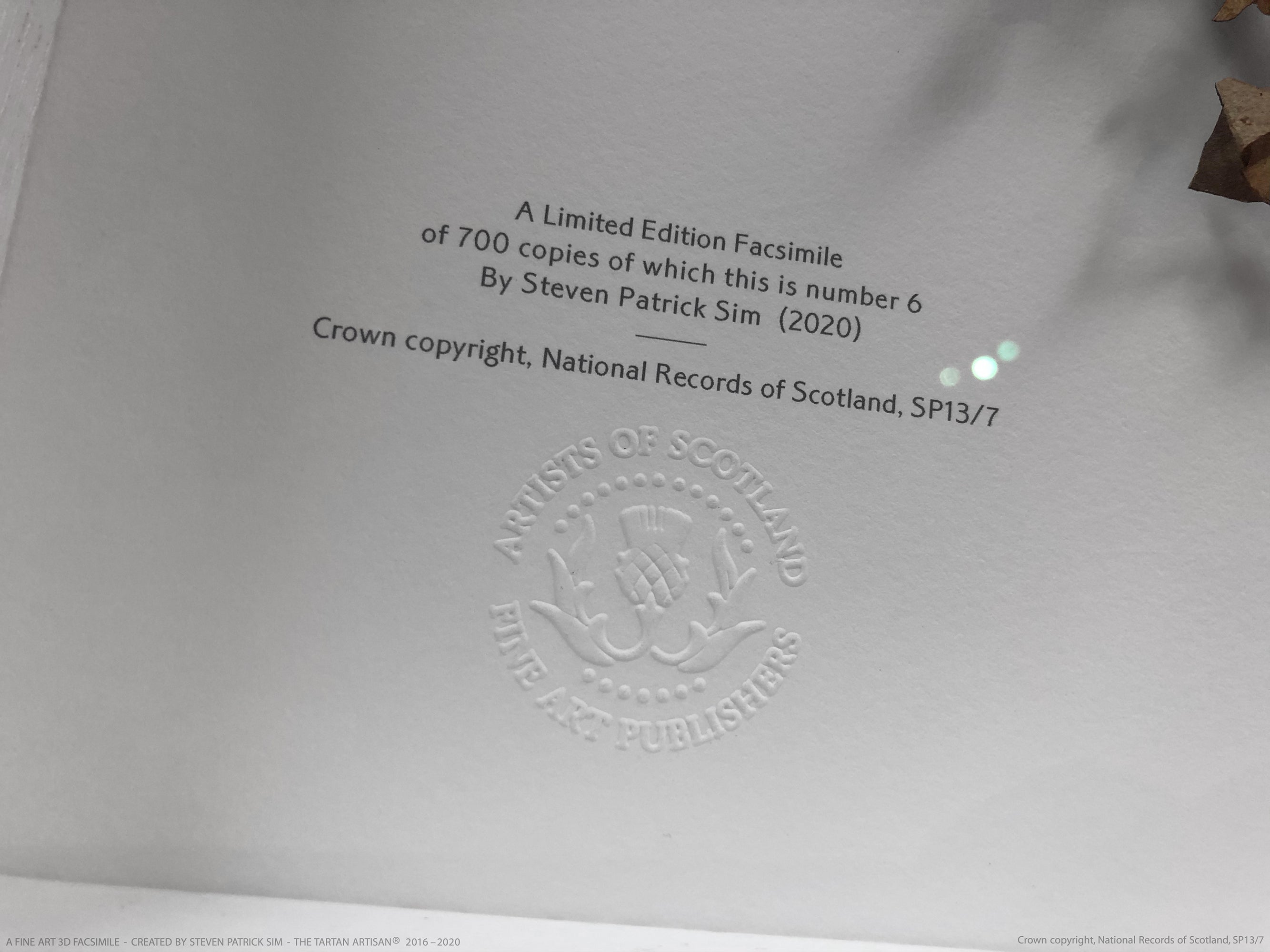 Close-up of the embossed National Records of Scotland and Crown copyright detail on the Declaration of Arbroath Fine-Art 3D Facsimile presentation.