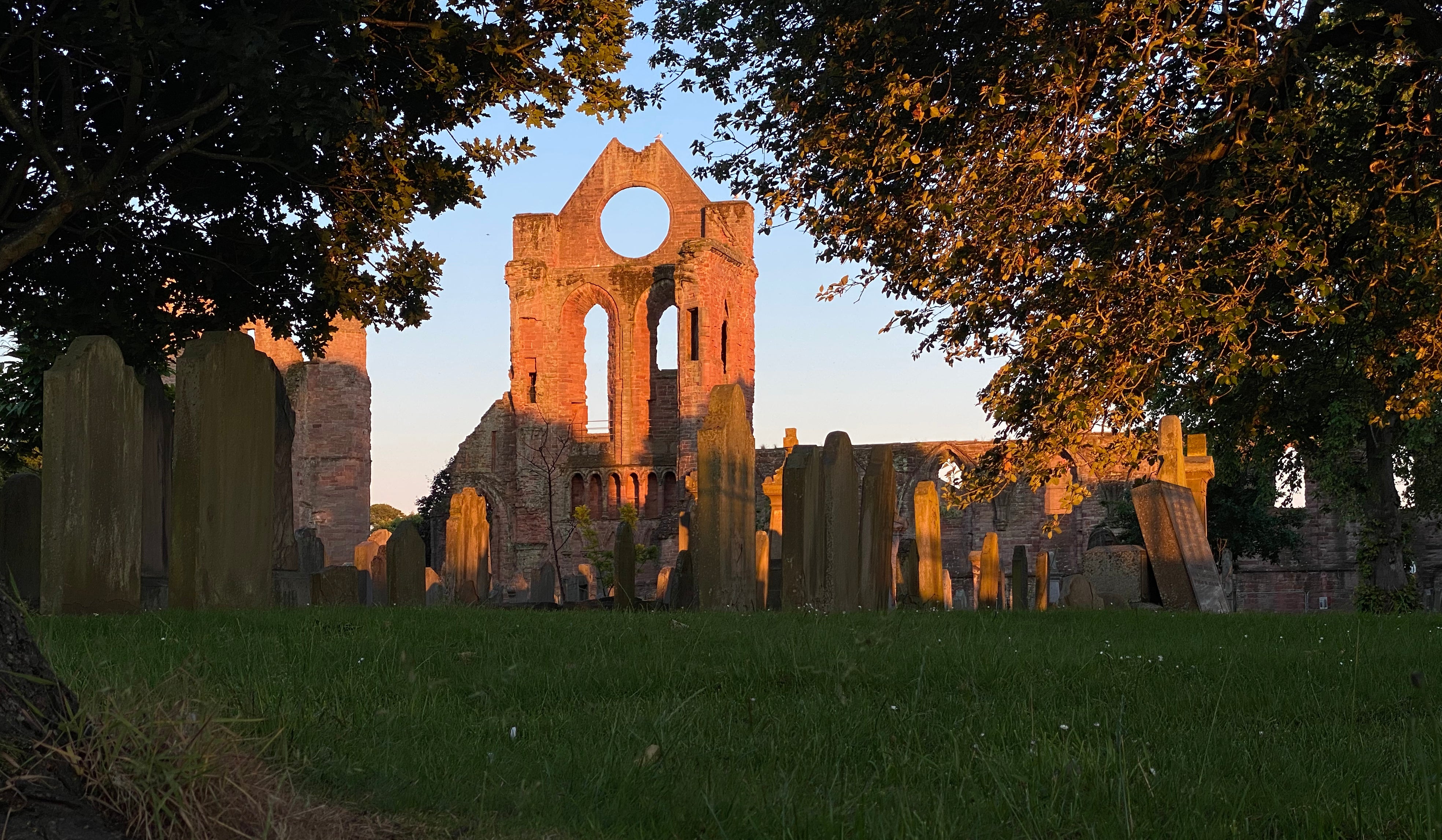 The Arbroath Abbey, the Round-O illuminated by the light of the setting Summer sun.