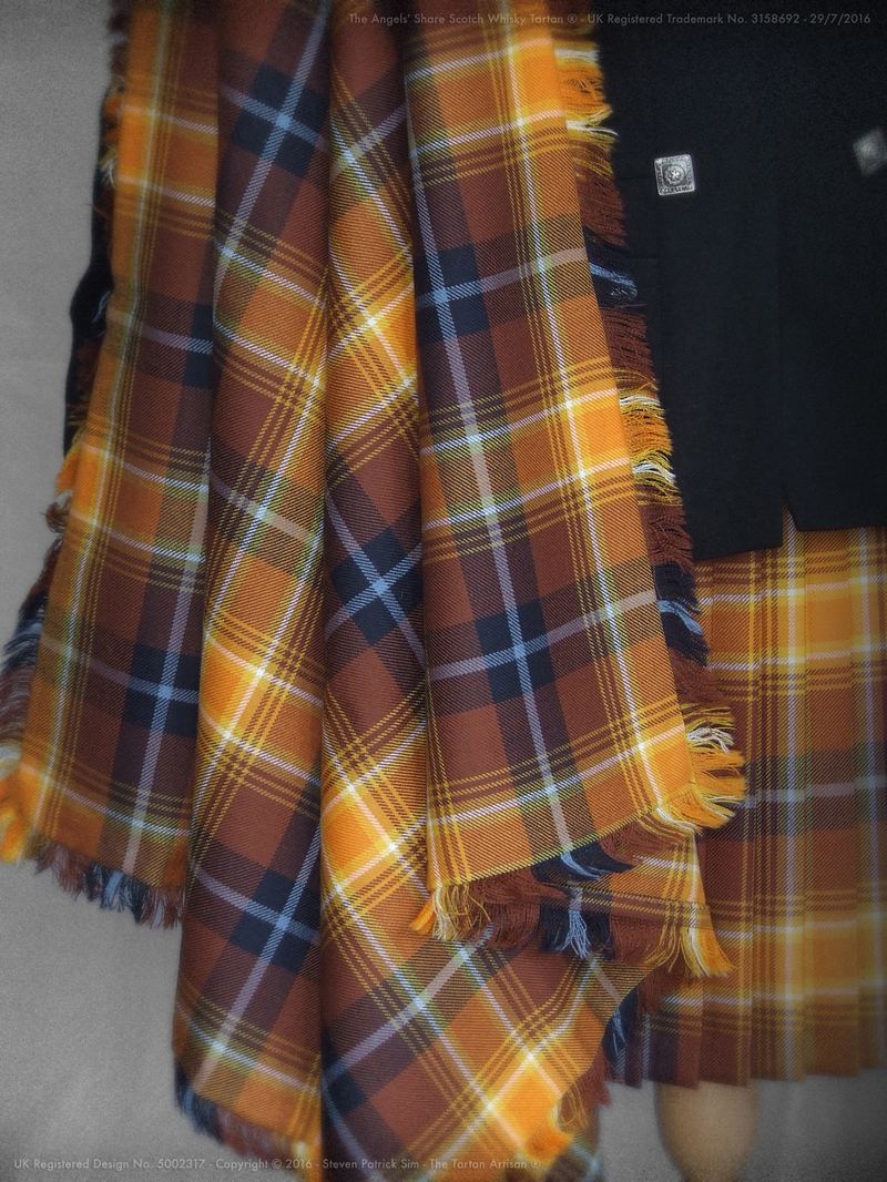 Traditional style Angels’ Share tartan fringed fly plaid photographed to emphasise heritage and craftsmanship.