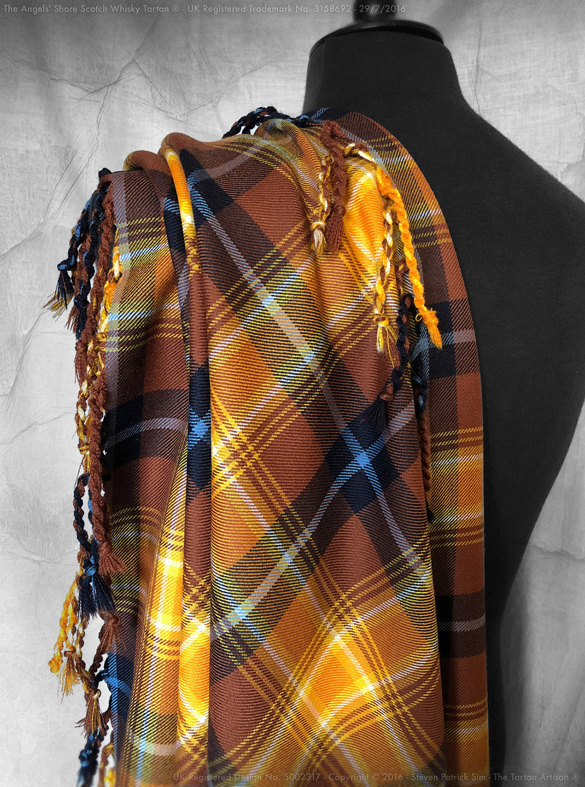 Showcasing the Angels' Share® tartan in its full ceremonial glory, this purled and knotted Highland plaid drapes with elegance and traditional depth. Designed by Steven Patrick Sim, it represents the celestial spirit of Scotch whisky in a 16oz heavyweight wool weave.