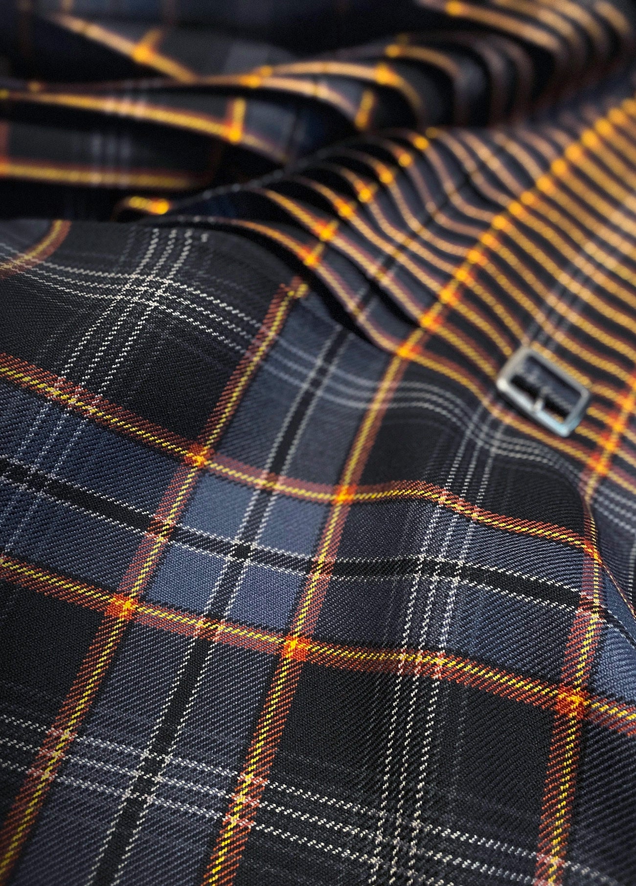 Close-up detail of the North Sea Oil tartan kilt showing precise pleating and sett alignment, highlighting the craftsmanship and depth of colour inspired by Scotland’s offshore oil heritage.