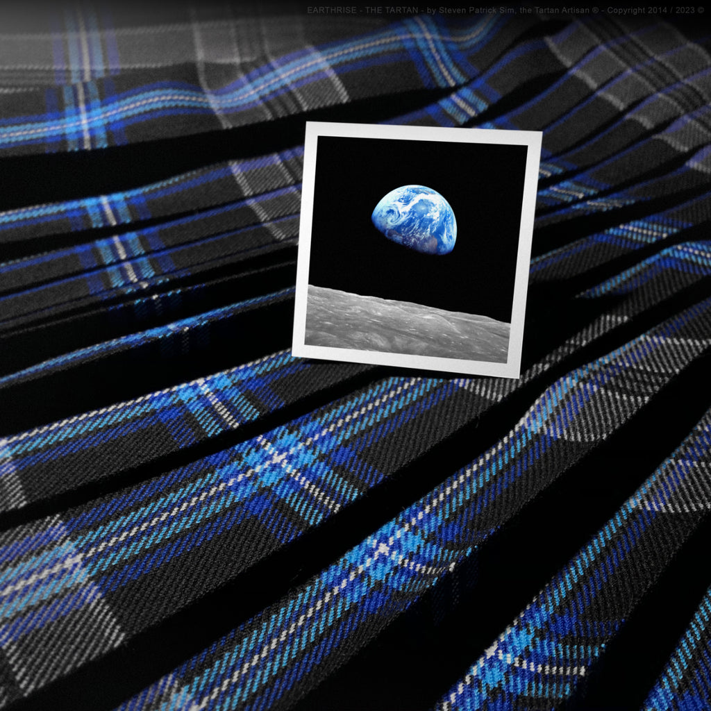 A close-up photograph of the Earthrise image itself, isolating the iconic Earth-above-the-Moon visual.