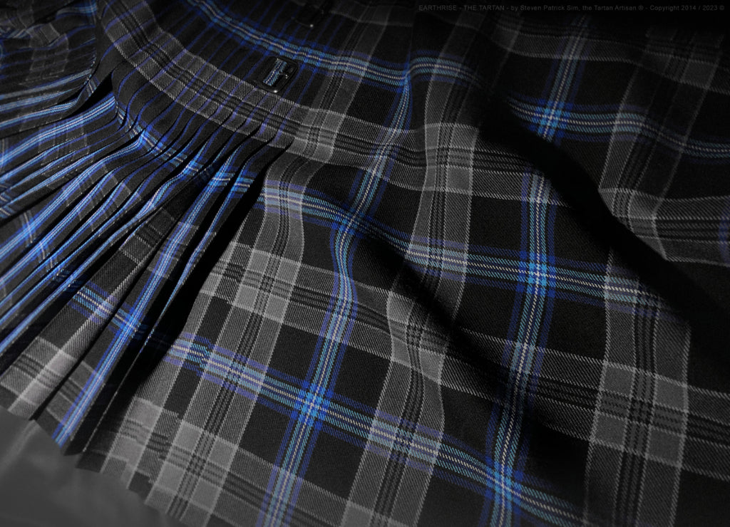 Another pleated detail showing light and shadow interacting with the blue striping of the Earthrise sett.