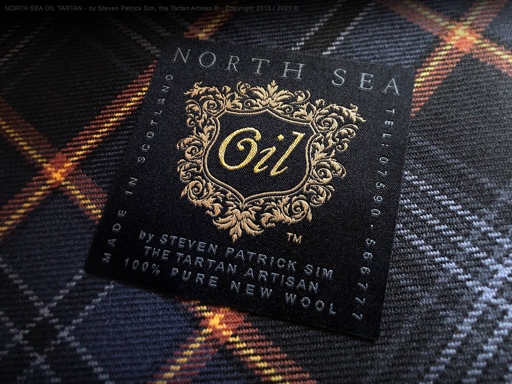 Label of the North Sea Oil tartan kilt, designed by Steven Patrick Sim the Tartan Artisan, showcasing the brand name and artisan signature on a quality fabric tag sewn into the kilt’s waistband, symbolizing authentic craftsmanship and heritage linked to Scotland’s offshore oil industry.