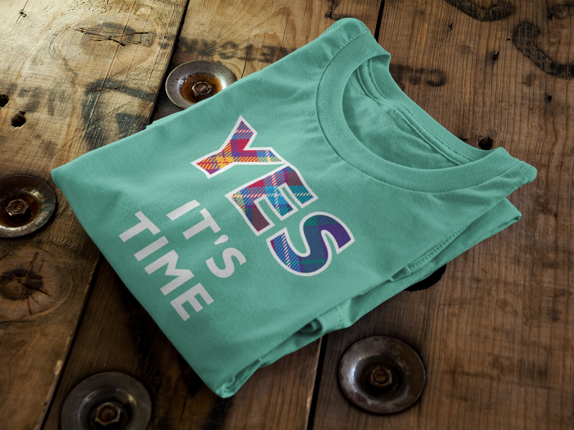 Green YES Tartan Logo on a green t-shirt