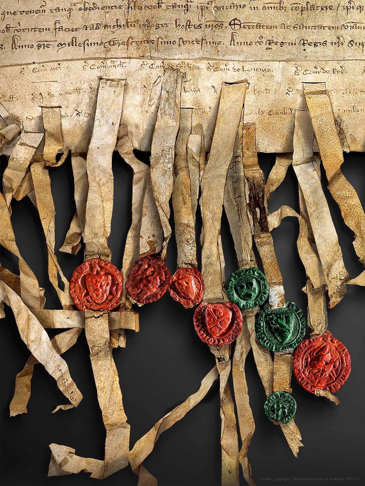 Tight close-up of parchment attachment tags and red and green seals hanging from the lower edge of the Declaration manuscript in the Black Onyx artwork.