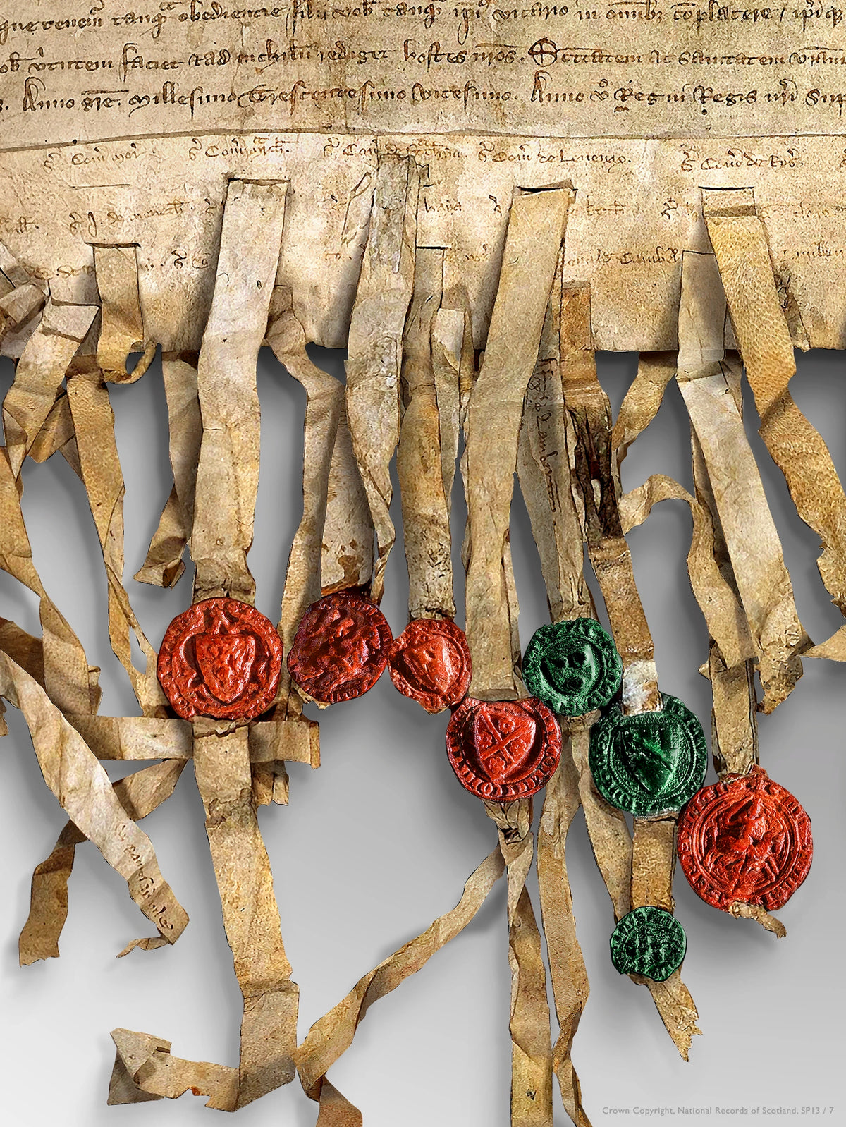 Close-up of the Pearl Burnished Gold Declaration of Arbroath print showing parchment tags and a cluster of red and green wax seals beneath the manuscript.