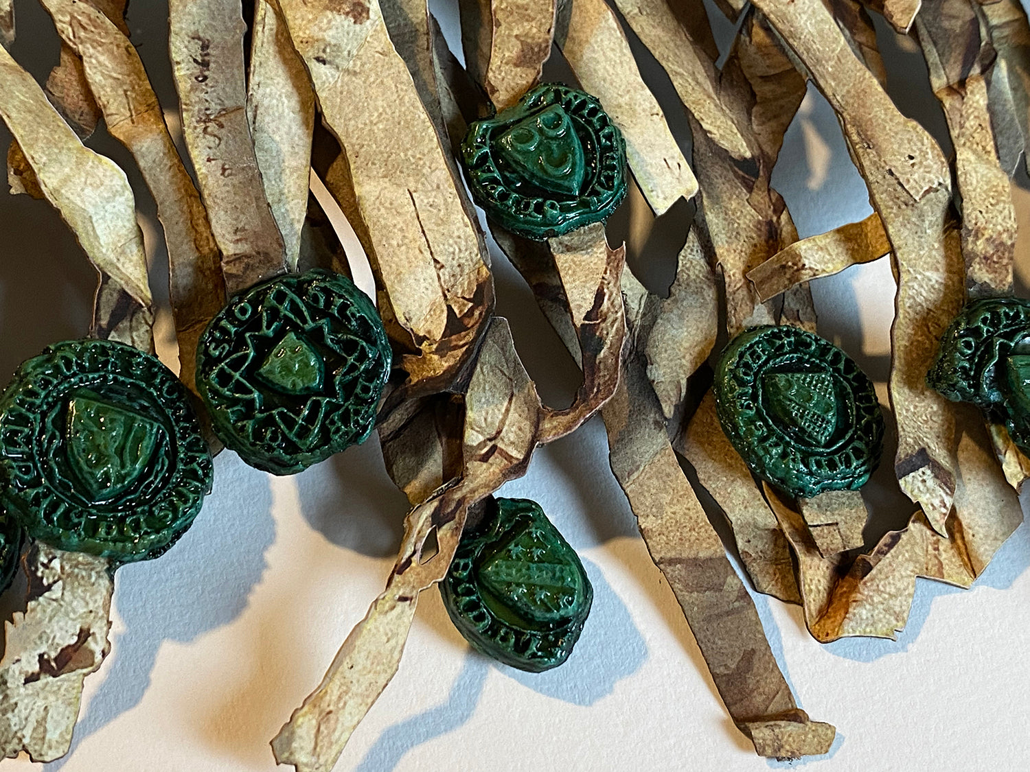 Close-up of green cast seals and parchment-style seal tags on the Declaration of Arbroath Fine-Art 3D Facsimile.
