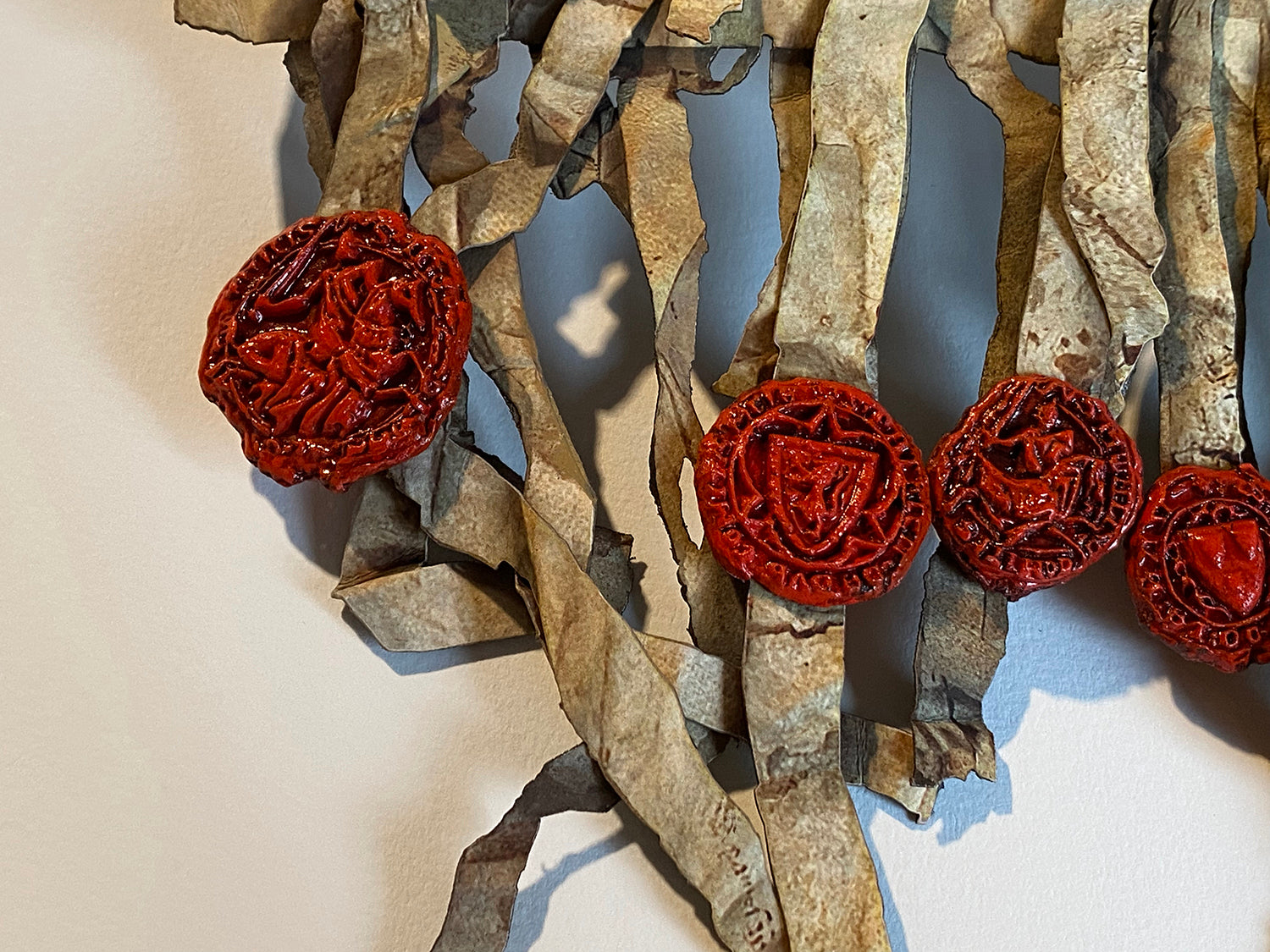 Close-up of red cast seals and parchment-style tags on the Declaration of Arbroath Fine-Art 3D Facsimile, 7th Centennial Edition.