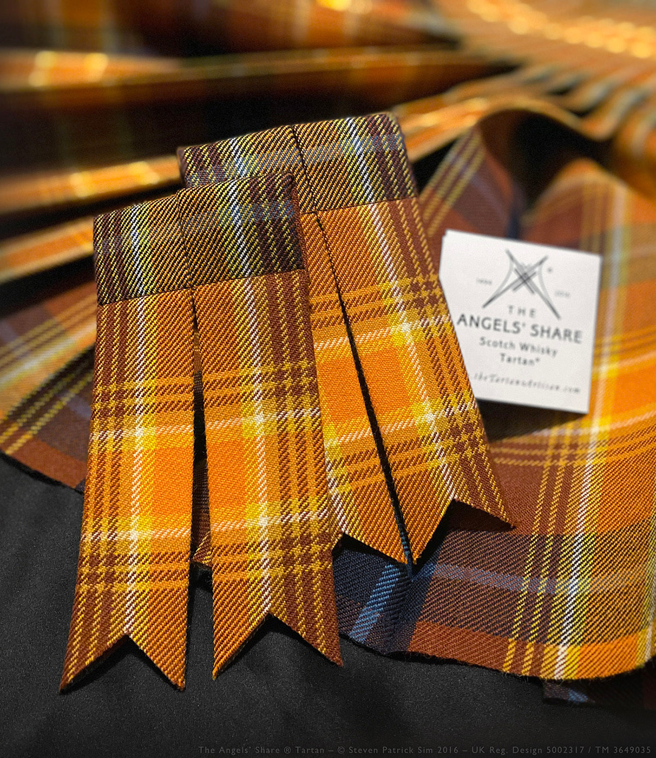 Angels’ Share tartan kilt flashes shown against a pleat-to-stripe kilt background.