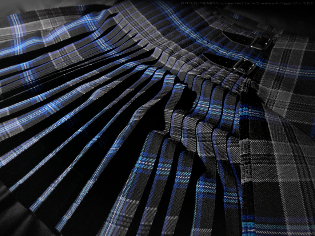 A further pulled-back view of the pleated Earthrise kilt, increasing context and scale while preserving the rising-Earth visual motif.