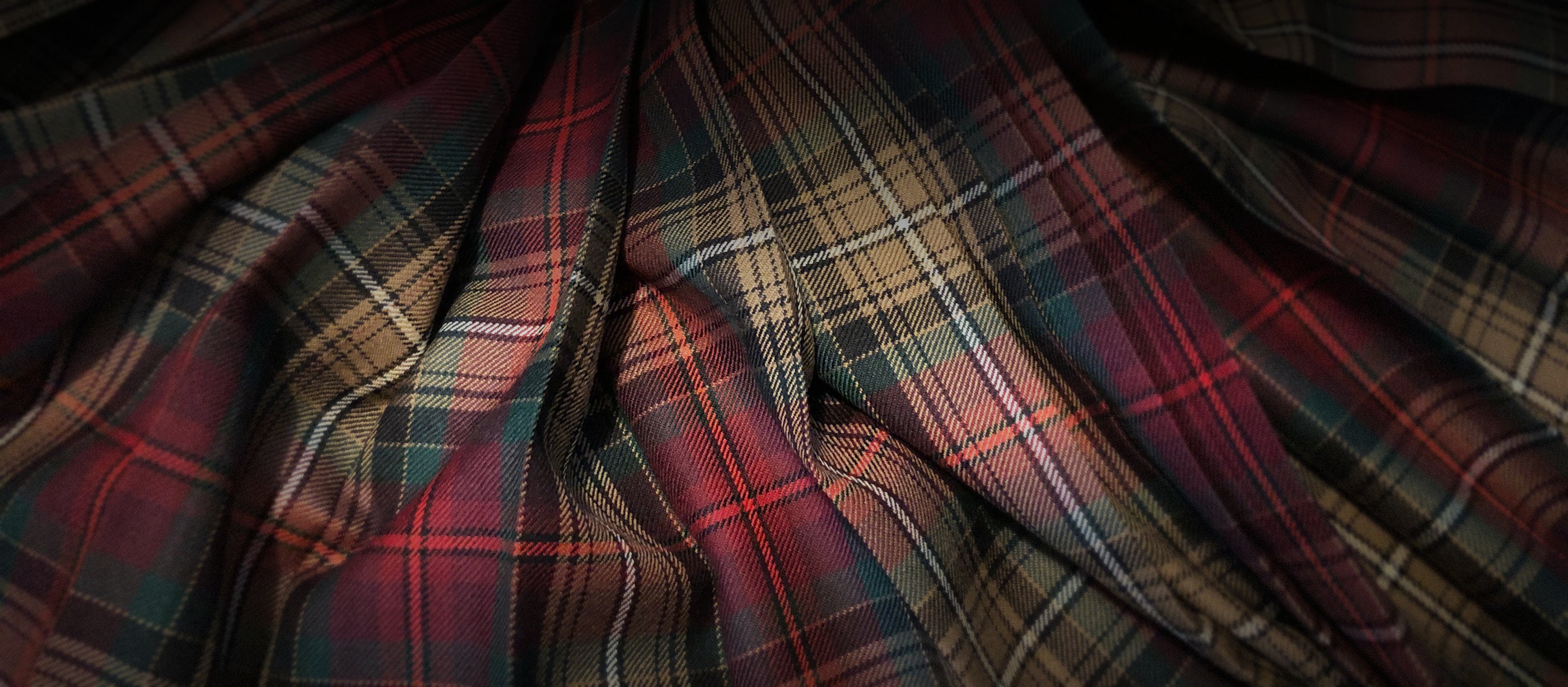 Wide image of the Declaration of Arbroath 7th Centennial Tartan showing its symbolic colour harmony.  