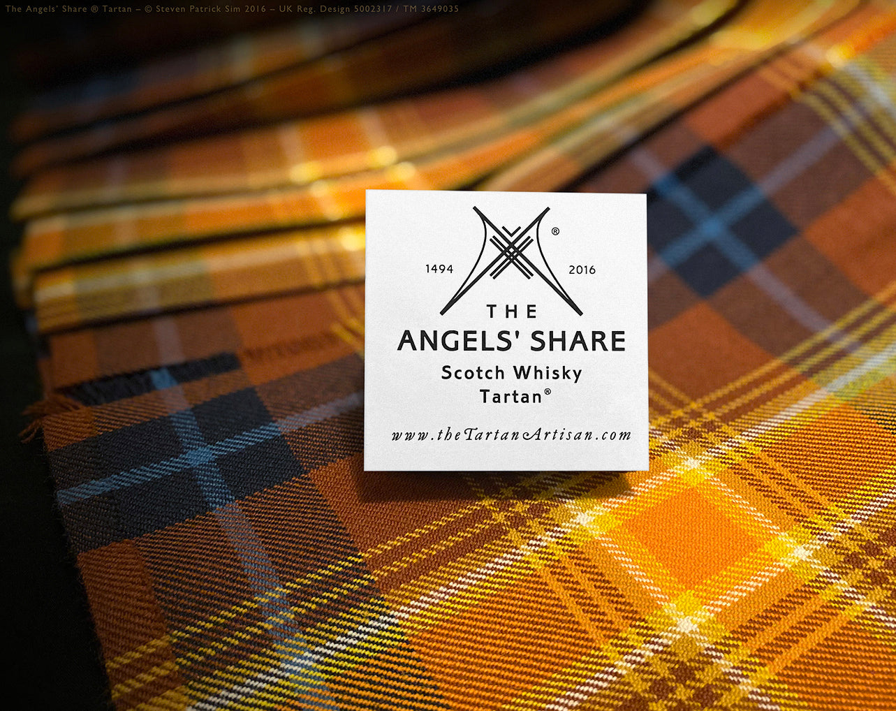 Capturing the rich amber and russet hues of the Angels’ Share® tartan in soft light, this image draws attention to the warmth and complexity of the colour palette. The photograph radiates the essence of aged Scotch whisky. By Steven Patrick Sim the Tartan Artisan.