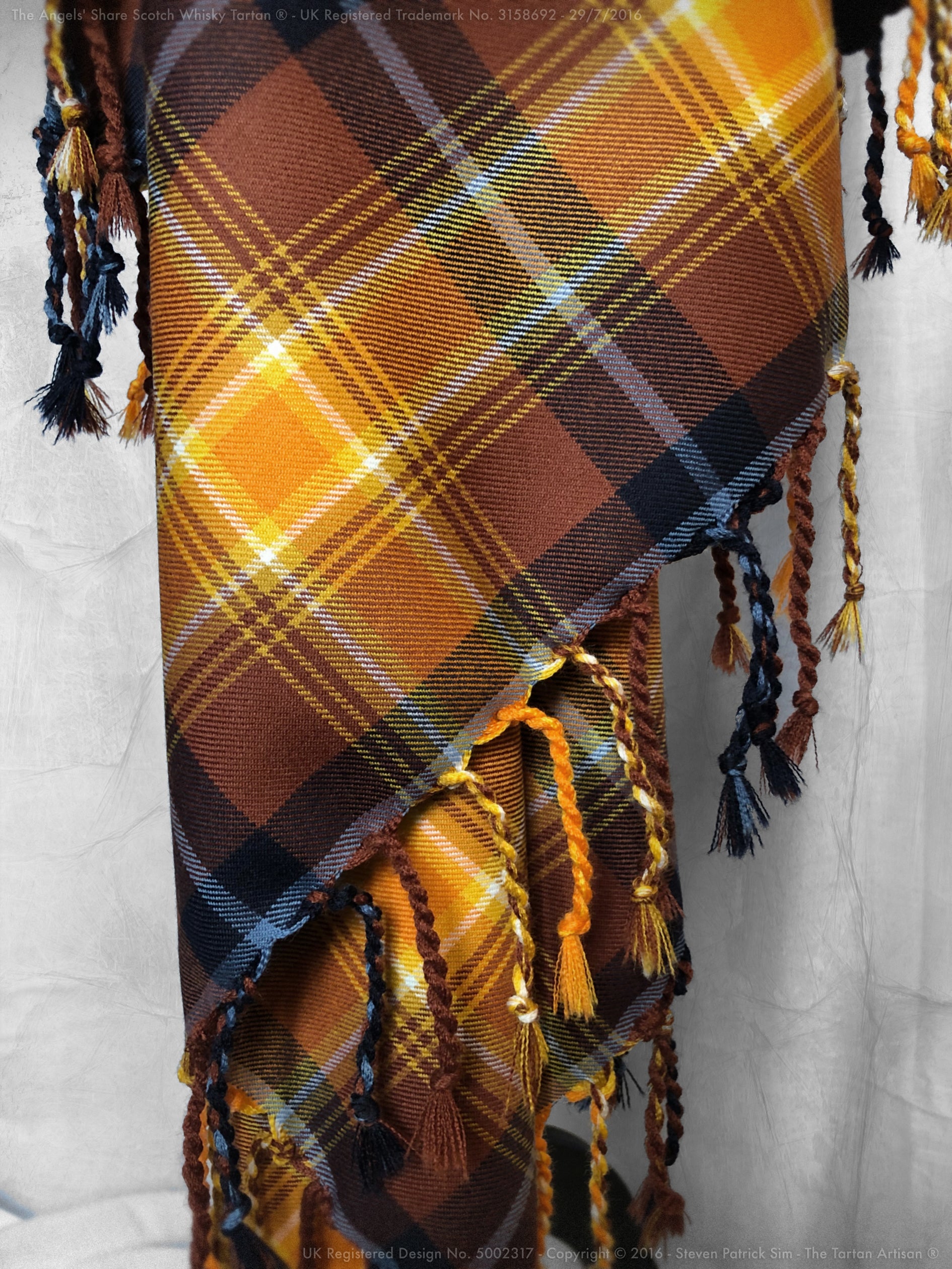 The Angels' Share Scotch Whisky Tartan Purled and Knotted Plaid created to celebrate Scotch whisky